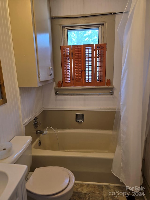 full bathroom with vanity, plus walk in shower, and toilet