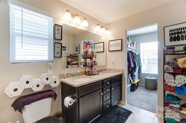 bathroom featuring vanity and tile patterned flooring