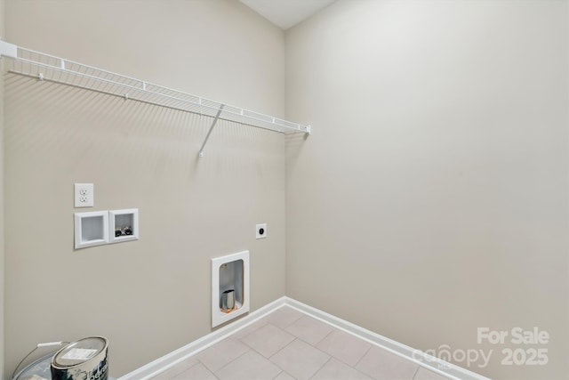 laundry room with hookup for a washing machine, light tile patterned floors, and hookup for an electric dryer