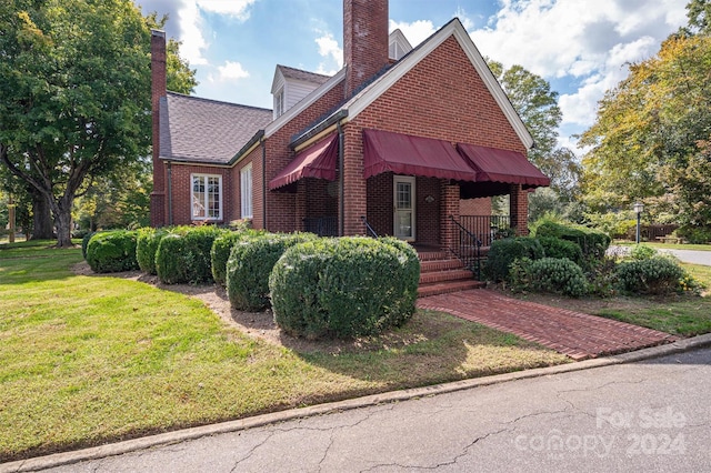 exterior space with a front yard