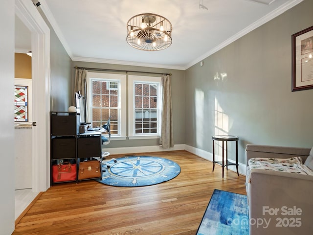 doorway with crown molding, an inviting chandelier, and light hardwood / wood-style floors