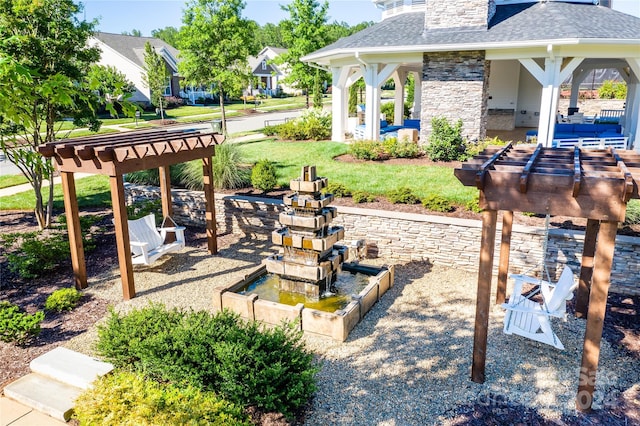 exterior space featuring a gazebo and a patio area