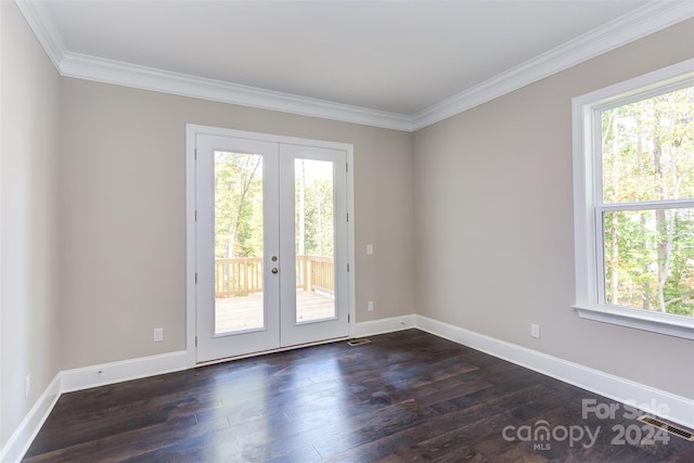 doorway to outside featuring french doors, ornamental molding, plenty of natural light, and dark wood-type flooring