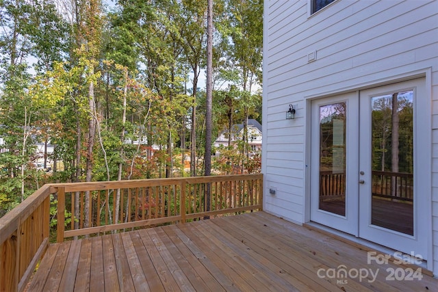 wooden terrace featuring french doors