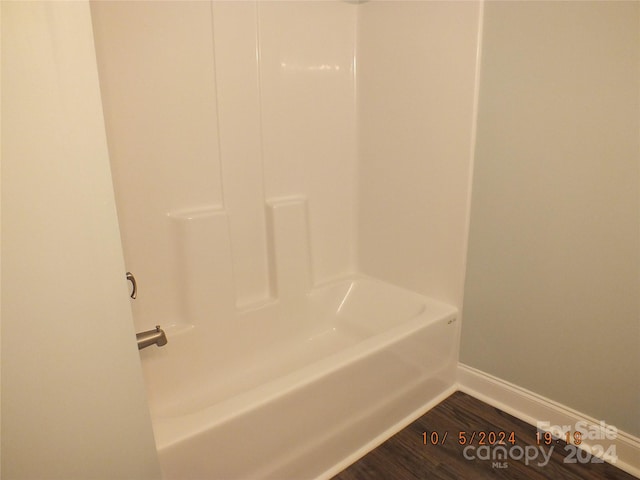 bathroom with wood-type flooring