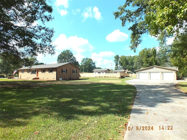 view of yard with an outdoor structure and a garage