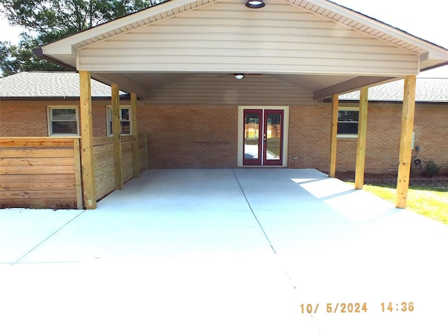 exterior space with a carport