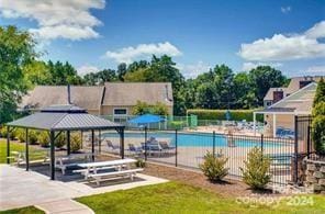 view of pool featuring a gazebo