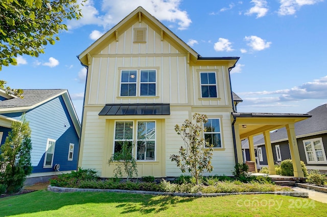 view of front of property with a front lawn