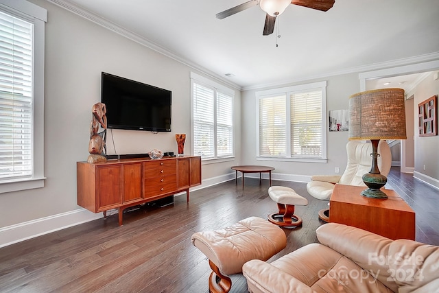 living room featuring ornamental molding, ceiling fan, and hardwood / wood-style floors