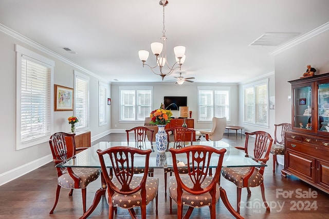 dining space with ceiling fan with notable chandelier, a wealth of natural light, ornamental molding, and dark hardwood / wood-style floors