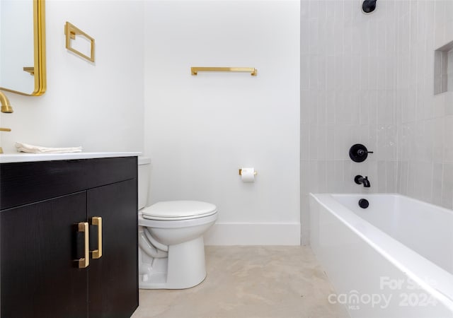 full bathroom featuring toilet, tiled shower / bath combo, vanity, and tile patterned floors