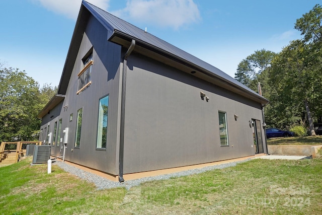 view of home's exterior featuring a yard