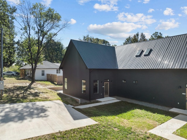 exterior space with a yard and a patio area