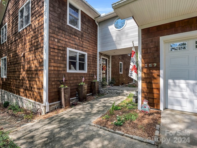 property entrance featuring a garage