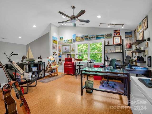 office featuring ceiling fan, vaulted ceiling, and light hardwood / wood-style flooring