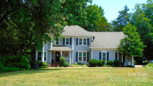 view of front of property with a front lawn