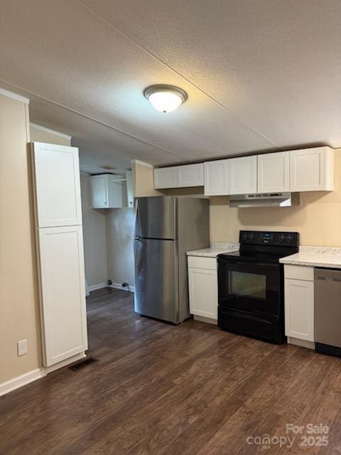 kitchen featuring dark hardwood / wood-style flooring, white cabinets, and appliances with stainless steel finishes