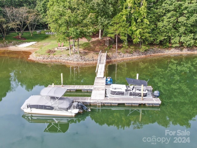 view of dock with a water view