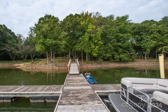 view of dock with a water view