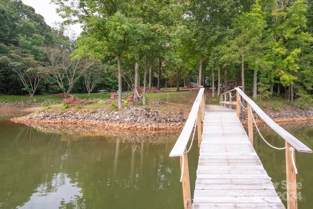 view of dock with a water view