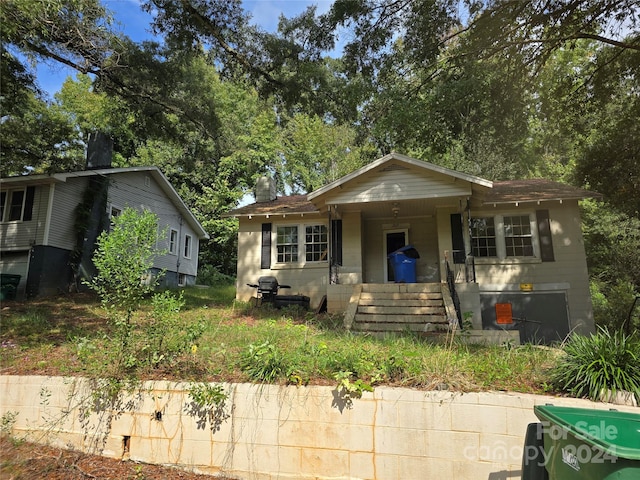 bungalow-style house with a porch