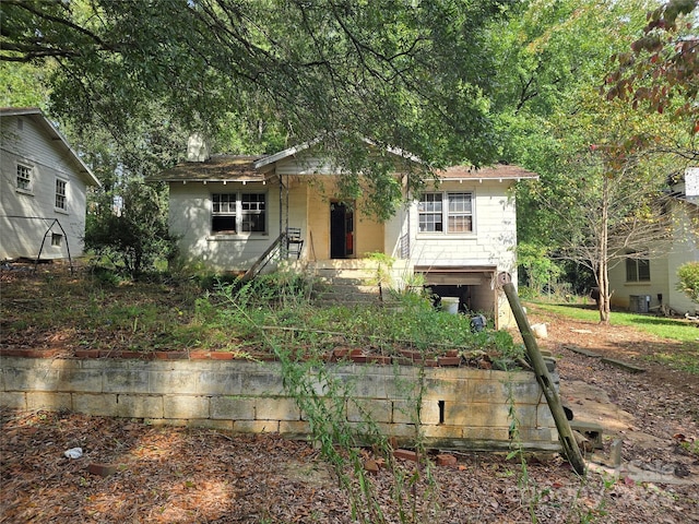 view of front of property featuring cooling unit