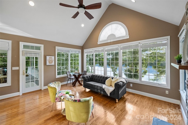 sunroom / solarium featuring vaulted ceiling and ceiling fan