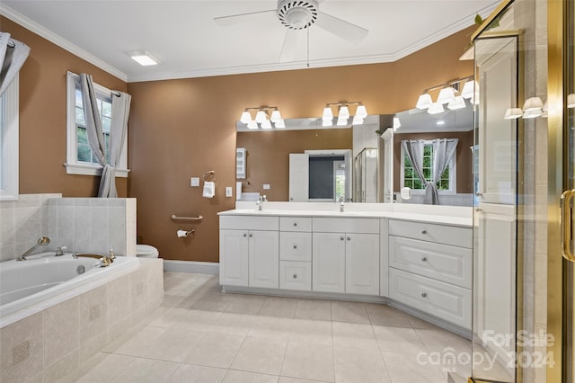 bathroom featuring tile patterned floors, separate shower and tub, ornamental molding, ceiling fan, and vanity