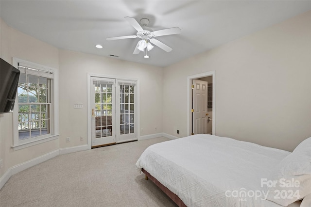 bedroom featuring carpet, ceiling fan, and access to exterior