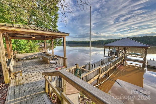 dock area with a water view