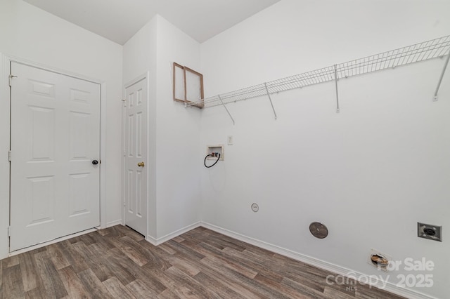 4803 Roxfield Ln, Charlotte, NC 28215 - laundry area with electric dryer hookup, wood finished floors, washer hookup, baseboards, and gas dryer hookup