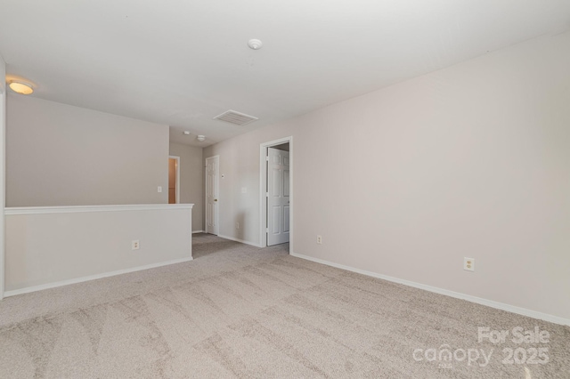 4803 Roxfield Ln, Charlotte, NC 28215 - empty room featuring carpet flooring and baseboards