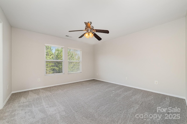 4803 Roxfield Ln, Charlotte, NC 28215 - unfurnished room featuring carpet, baseboards, and ceiling fan
