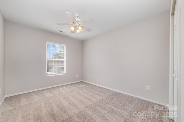 4803 Roxfield Ln, Charlotte, NC 28215 - spare room with carpet flooring, baseboards, and ceiling fan