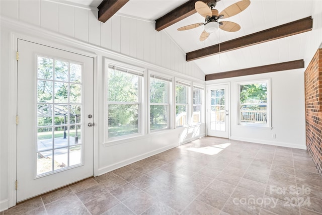 unfurnished sunroom featuring vaulted ceiling with beams and ceiling fan