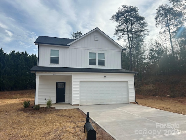 view of front of home with a garage