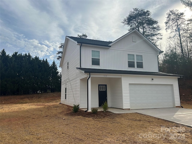 front of property featuring a garage