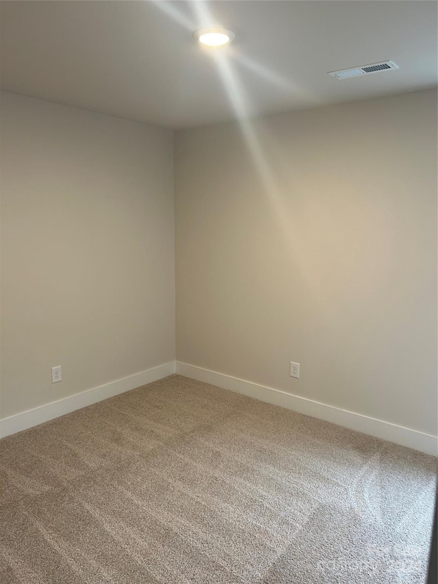 view of carpeted spare room