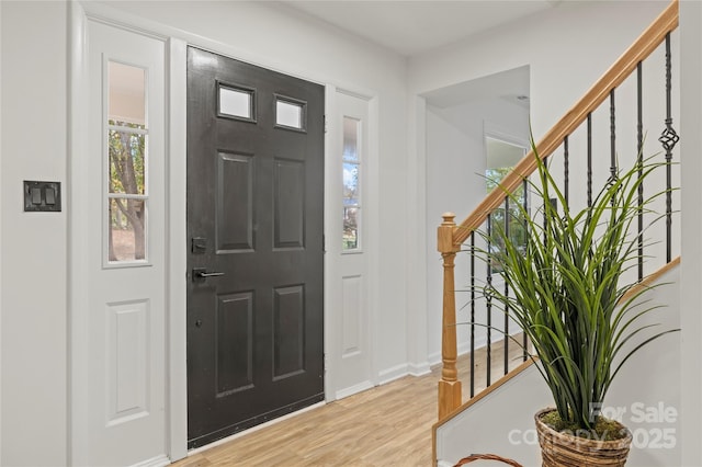 entrance foyer with light wood-type flooring