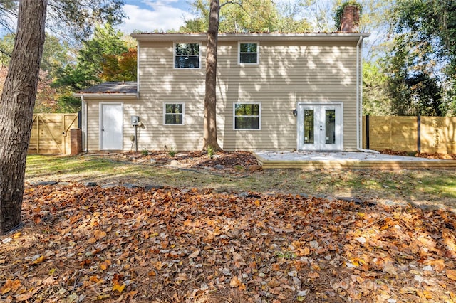 back of house featuring a patio area and french doors