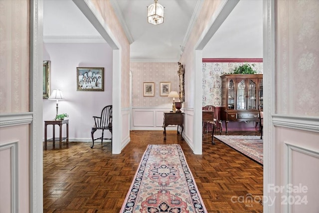 corridor featuring dark parquet flooring and ornamental molding