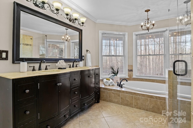 bathroom featuring a chandelier, a healthy amount of sunlight, and ornamental molding