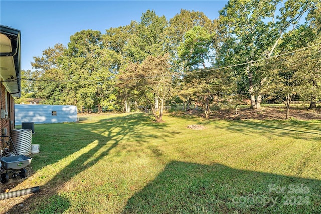 view of yard featuring central AC