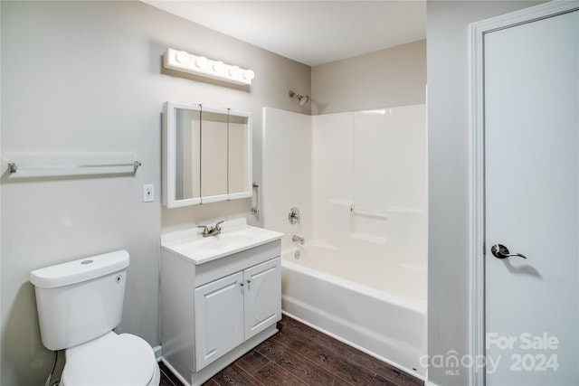 full bathroom with wood-type flooring, vanity, toilet, and tub / shower combination