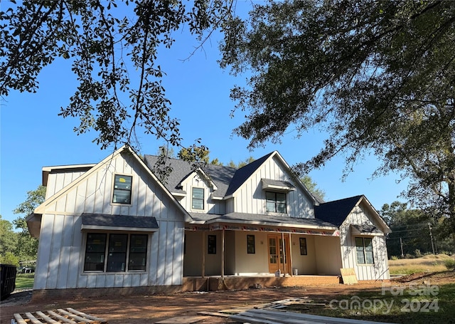 modern inspired farmhouse with a porch