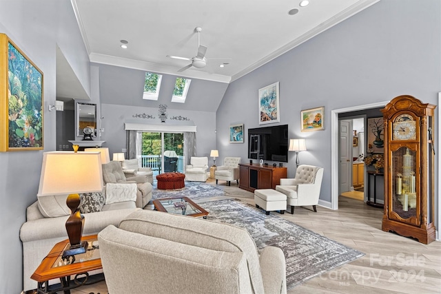 living room with ceiling fan, crown molding, light hardwood / wood-style floors, and high vaulted ceiling