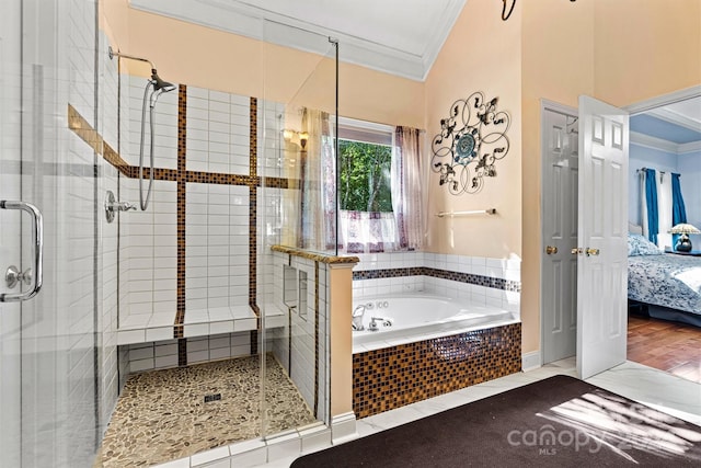 bathroom featuring plus walk in shower, ornamental molding, and wood-type flooring