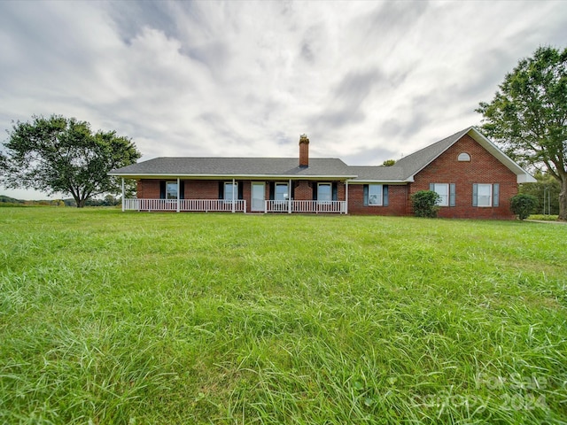 8510 Olive Branch Rd, Marshville, NC 28103 - single story home featuring a chimney, brick siding, and a front lawn