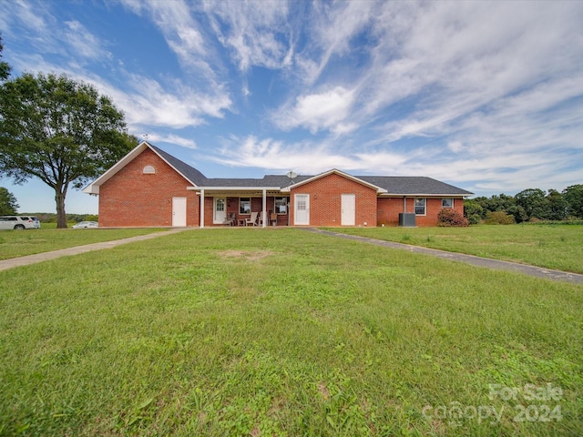 8510 Olive Branch Rd, Marshville, NC 28103 - single story home with brick siding and a front lawn